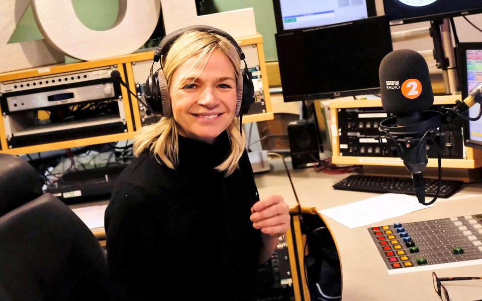 Zoe Ball, BBC Radio 2 DJ, in a recording studio.