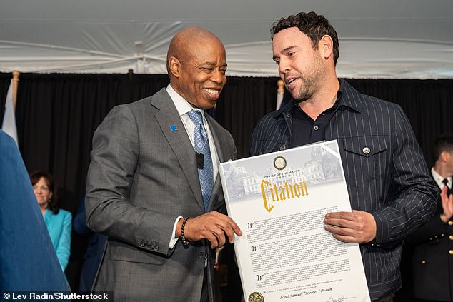 In contrast, Scooter is a Democrat, having hosted a fundraiser for Hillary Clinton at his home in 2015 (pictured with mayor Eric Adams in 2024)