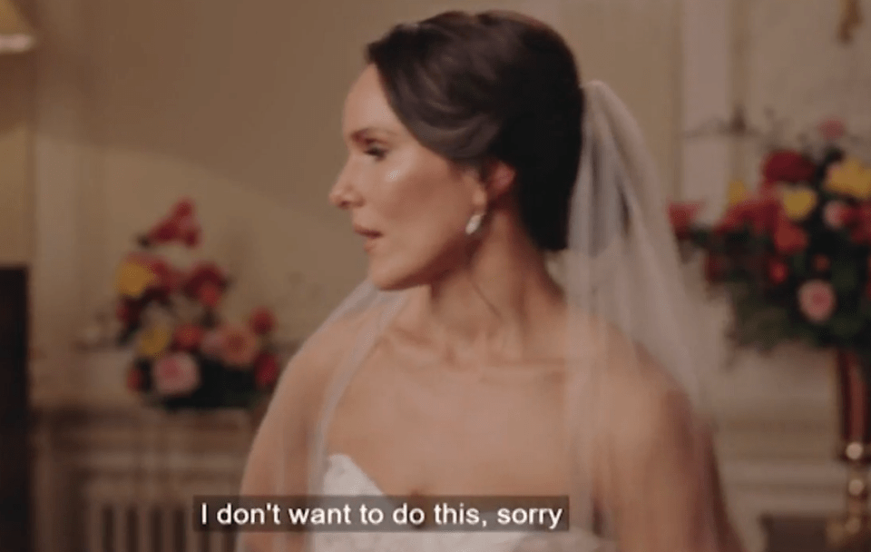 A bride with dark hair and a white veil is looking away, with the caption "I don't want to do this, sorry".