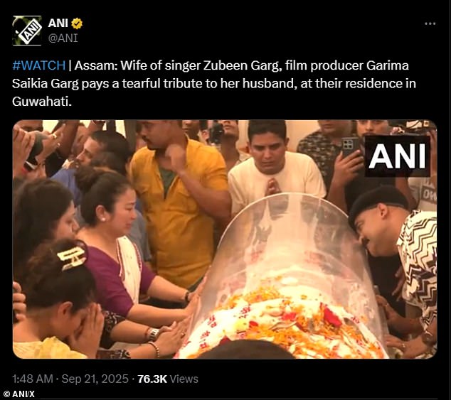 ANI tweeted a video on Sunday of the grieving widow crying with both hands pressed on the Wide Angle star's glass coffin