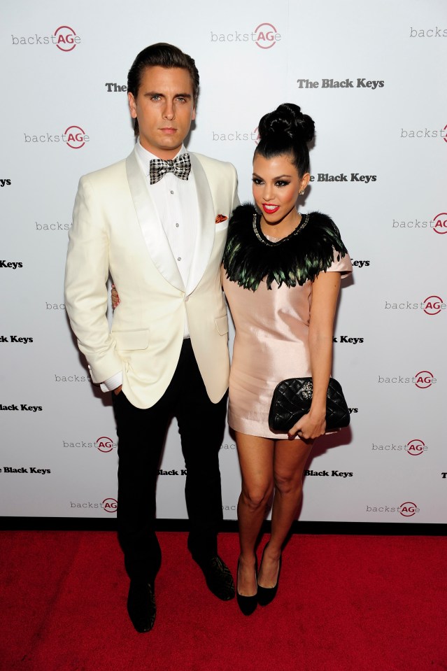 Television personalities Scott Disick and Kourtney Kardashian on the red carpet.