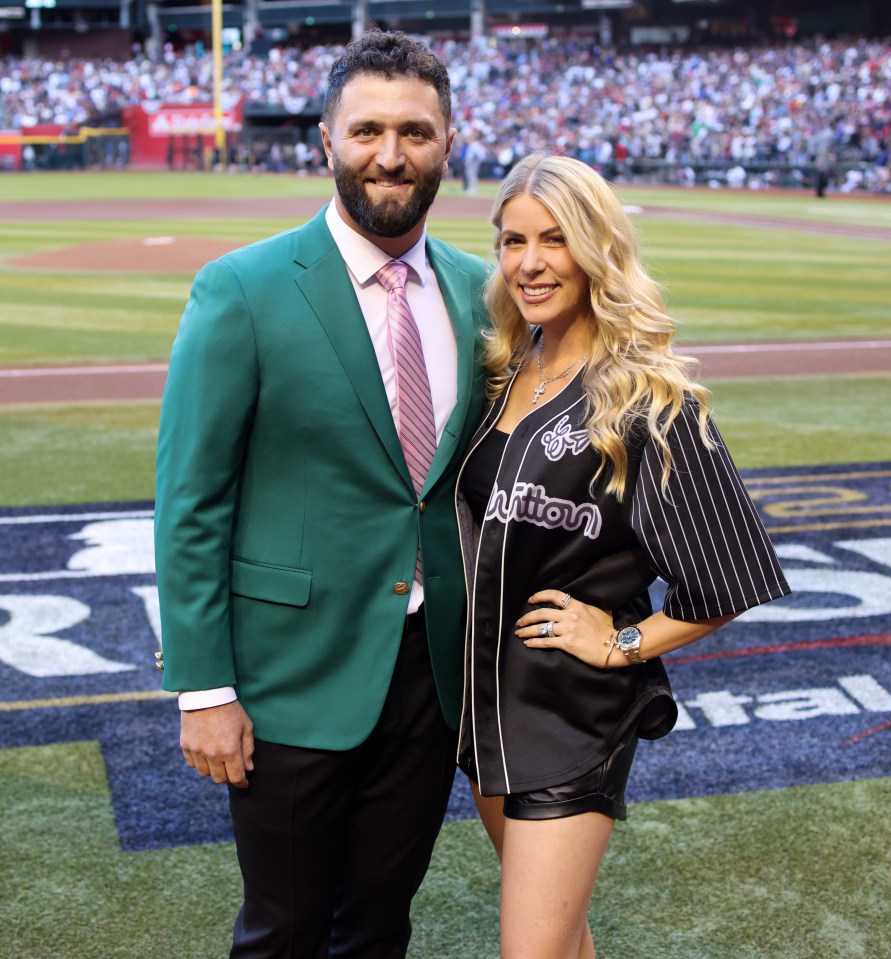 Masters champion Jon Rahm poses with his wife, Kelley Cahill, prior to Game 4 of the 2023 World Series.