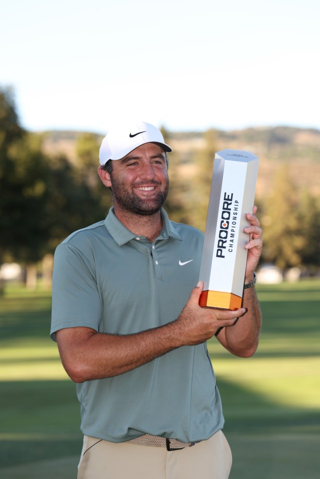 NAPA, CALIFORNIA - SEPTEMBER 14: Scottie Scheffler of the United States poses with the trophy after his winning round on the 18th hole during the final round of the Procore Championship 2025 at Silverado Resort and Spa on September 14, 2025 in Napa, California. (Photo by Mike Mulholland/Getty Images)