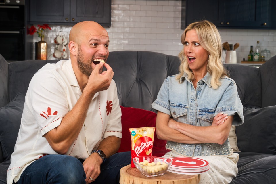 *** FREE FOR EDITORIAL USE ***<br />
Kate Lawler and Boj debate the ‘right way’ to eat Maltesers®, as Maltesers® White lands on shelves nationwide.