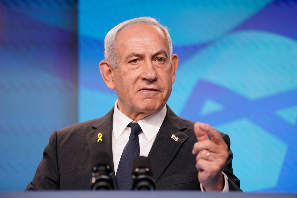 Israeli Prime Minister Benjamin Netanyahu gestures during a press conference.