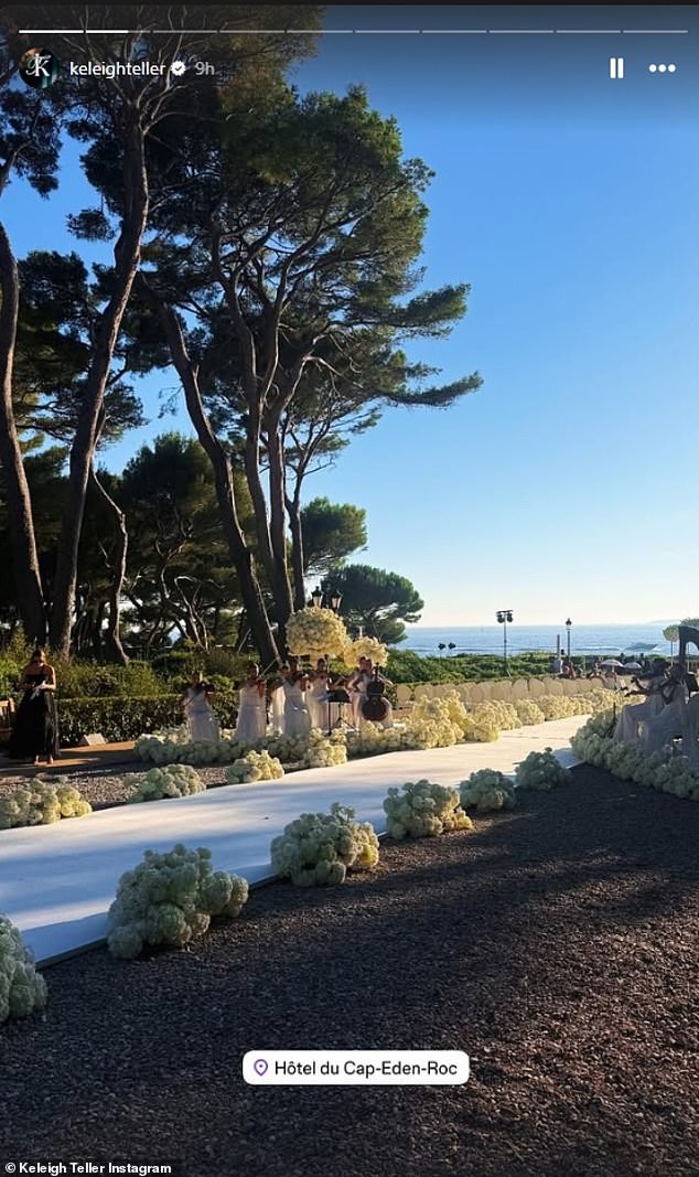 Guests lined a sprawling white carpeted al fresco aisle, with 14 musicians accompanying the wedding party's arrival