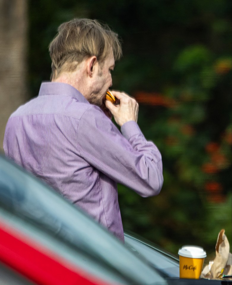 Christian Brueckner eating a hamburger at McDonald's in Buchholz in der Nordheide.