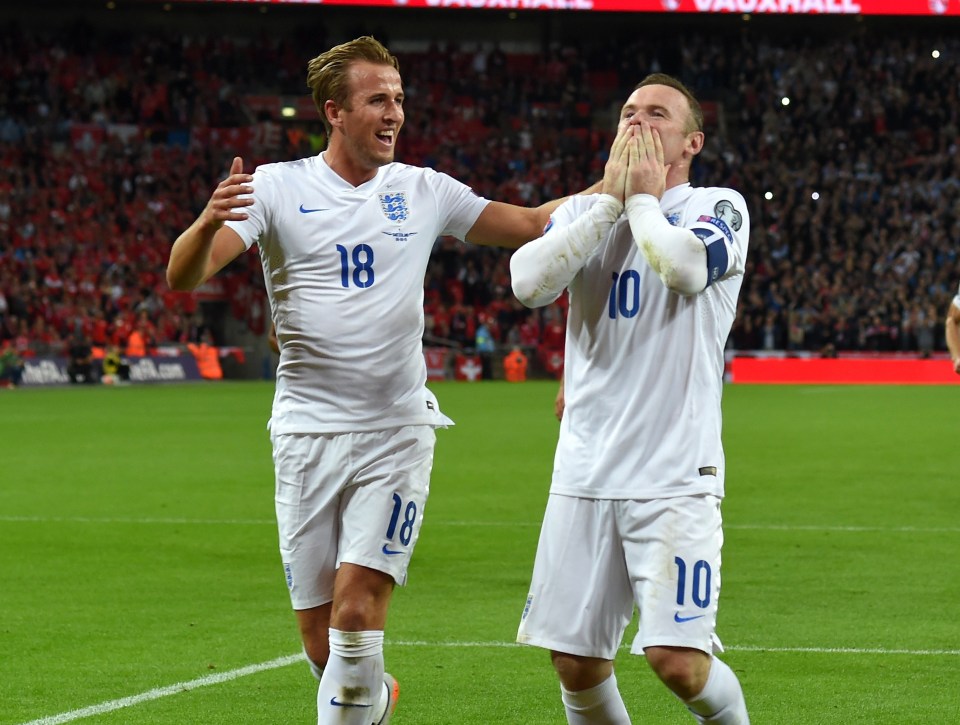 Wayne Rooney celebrating scoring his record-breaking 50th goal with Harry Kane during a UEFA EURO 2016 Qualifier match.