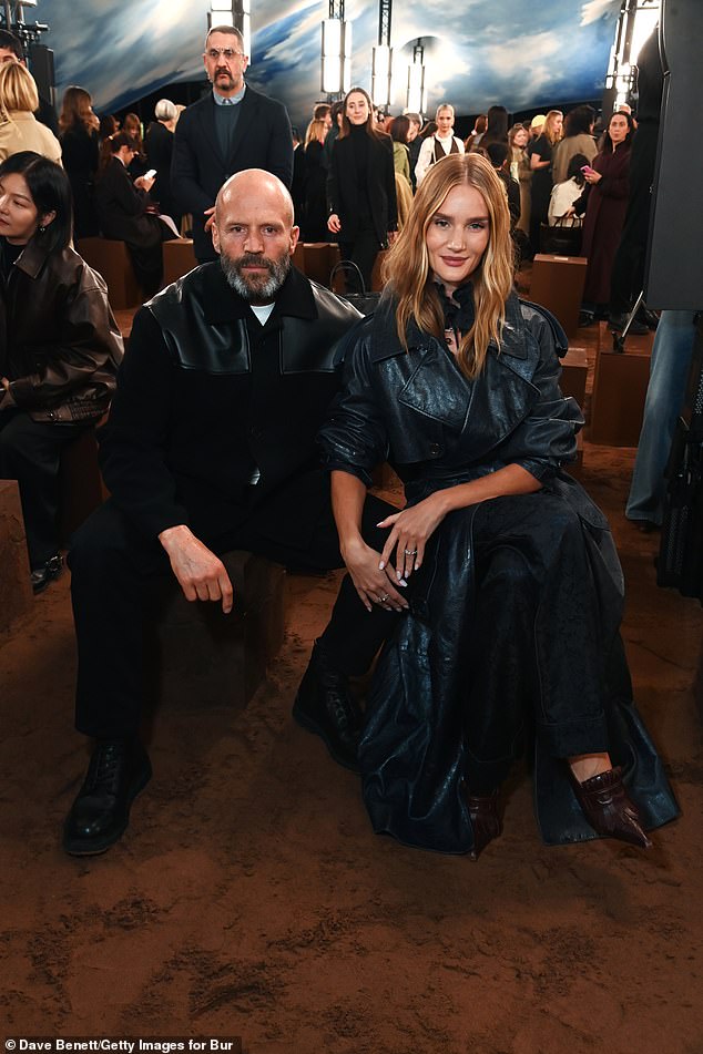 She was joined at the runway show by her movie star fiancé Jason Statham, who looked as handsome as ever in a trendy black jacket with leather panels