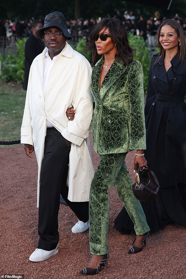 But Naomi Campbell soon became the centre of attention, as she made her stylish arrival arm-in-arm with pal and former British Vogue editor Edward Enninful