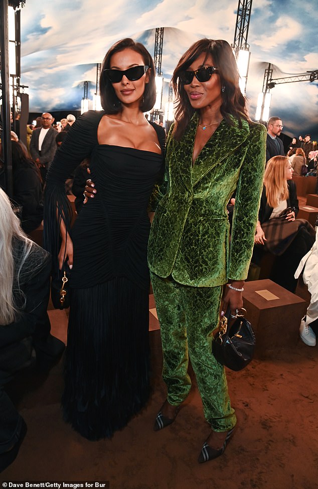 The supermodel looked nothing short of sensational in a forest green velvet suit embossed with an intricate pattern, that showcased her long legs and statuesque frame