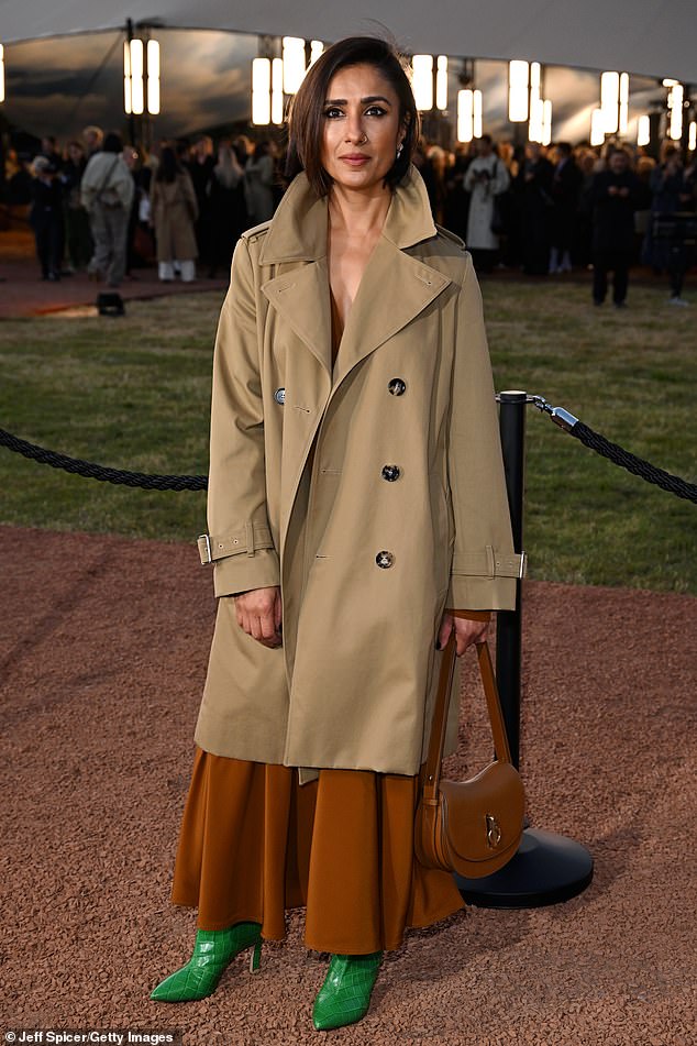 Anita Rani added a bright pop of colour to her neutral toned look with a pair of bold green snakeskin boots