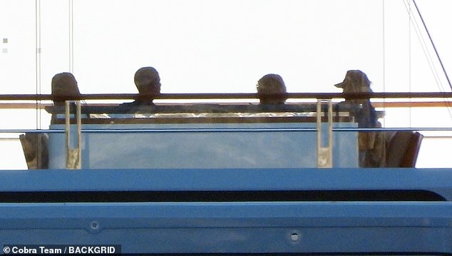 The morning after Barack joined Michelle and Spielberg on the yacht, the group enjoy breakfast on the deck, before they head ashore to Punta Chiappa for lunch