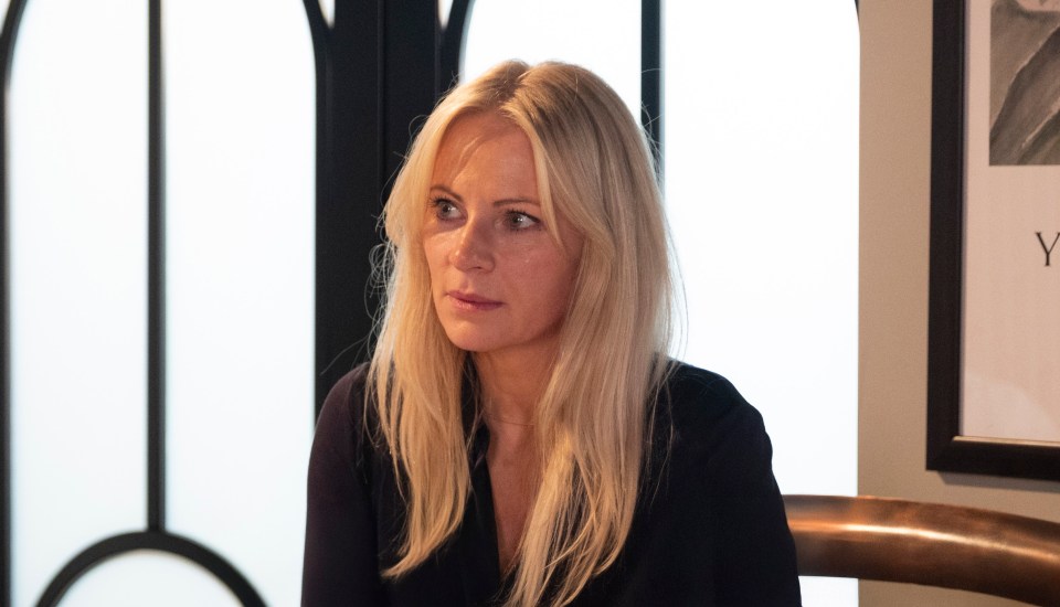 Lisa Swain (Vicky Myers) looking shocked.