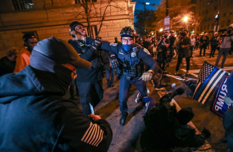 Proud Boys and Antifa fight after the "Million MAGA March" in Washington, DC.