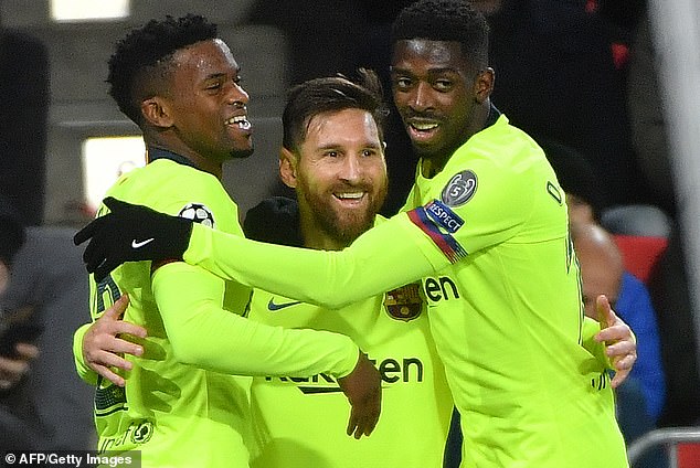 Dembele is pictured with Lionel Messi and Nelson Semedo during his ill-fated Barcelona spell