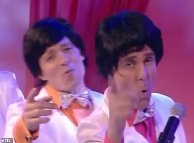 John (R) can seen alongside his fellow ITV broadcasters dressed as The Osmonds while serenading Fiona with her favourite song Love Me for a Reason (pictured with Ben Shephard)
