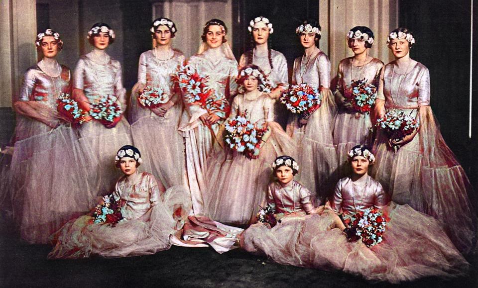 Group wedding photograph of Mrs. Bryan Guinness, formerly Miss Diana Freeman Mitford, with eleven bridesmaids.