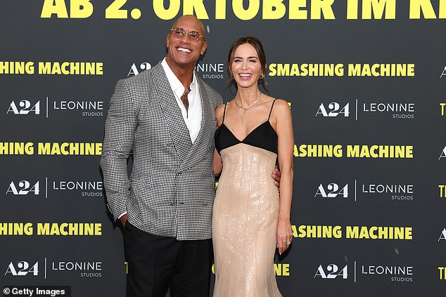 Meanwhile the actor, 53, cut a dapper look in a checked blazer jacket and stylish shades