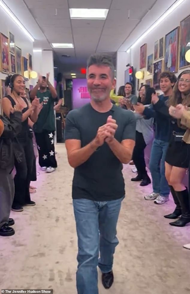 The music mogul, 65, looked in good spirits as he was treated to the talk show's 'spirit tunnel' before entering the studio