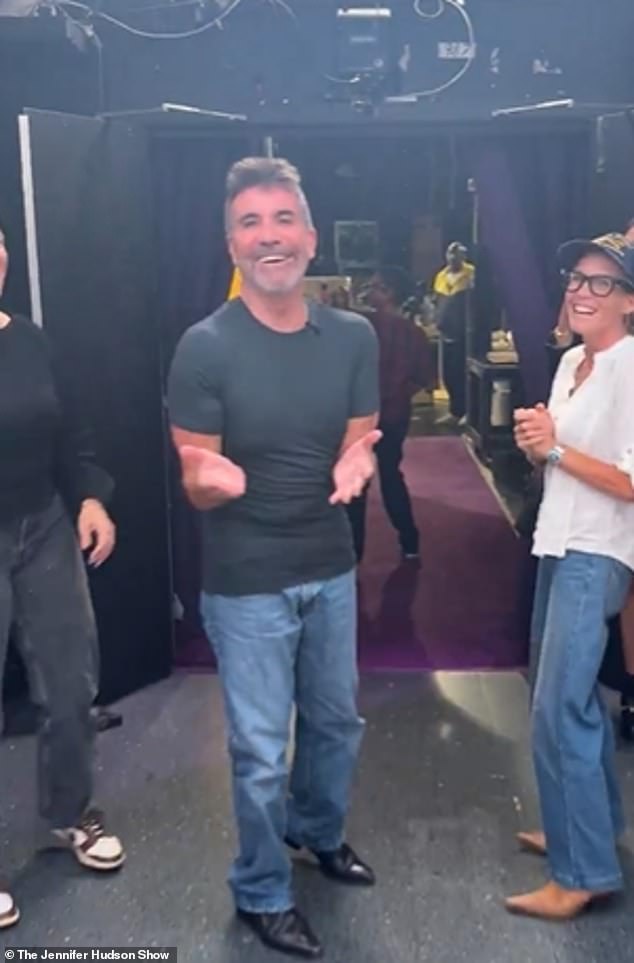 Simon reached the end of the corridor and joked, 'Can I do that again' before walking on set