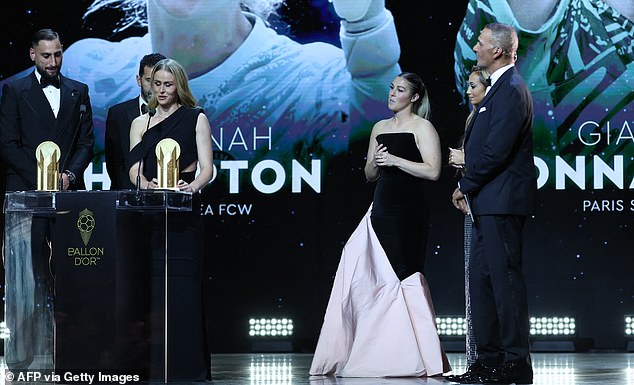 Donnarumma, Buffon and Hampton stood close together but Earps kept her distance on stage