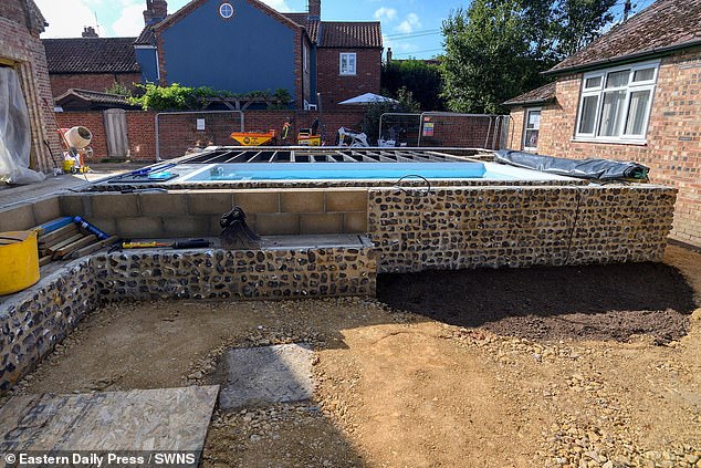 Plans were approved for the conversion and a plunge pool (pictured) last year. But WI members claim the pool has since been turned 90 degrees so it now blocks off an area they once used
