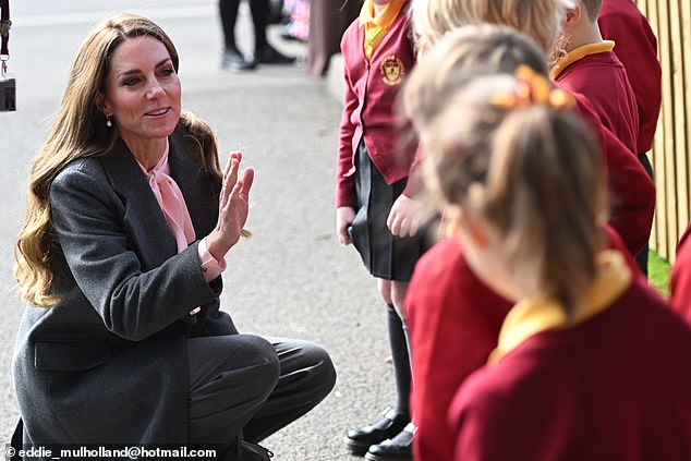 The Princess of Wales appeared keen to talk to the children waiting at the Southport school