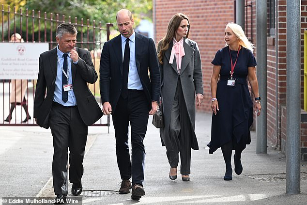 The Prince and Princess of Wales with junior school headteacher Adrian Antell (left) and infant school headteacher Jennifer Sephton, during a visit to Farnborough Road Infant and Junior School
