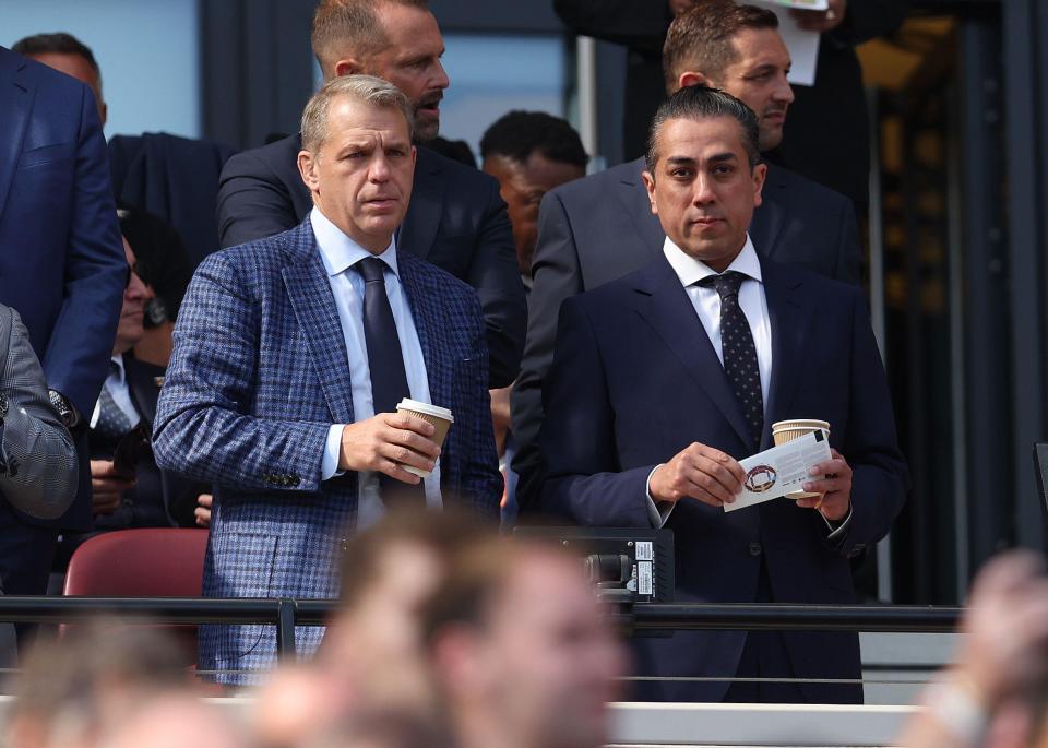 Todd Boehly and Behdad Eghbali watching the Premier League match at the London Stadium.