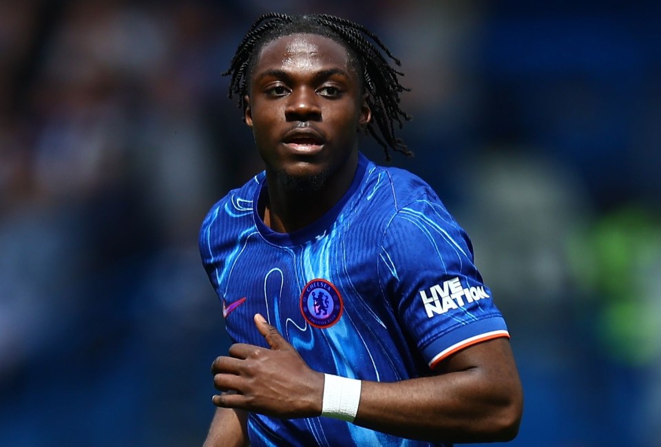 Romeo Lavia of Chelsea in a blue jersey with number 45 and white socks playing football.