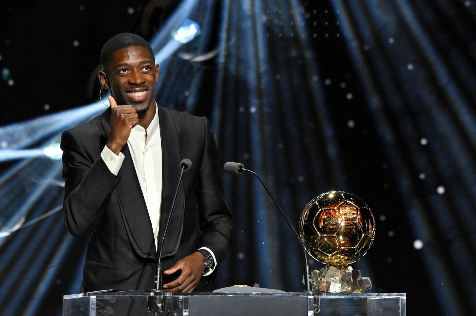 Ousmane Dembele with the Men's Ballon d'Or trophy.