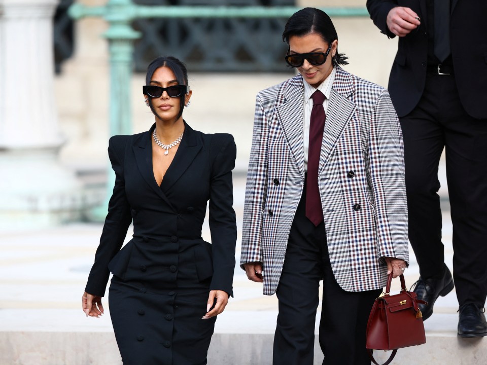 Kim Kardashian and Kris Jenner leave the courthouse during the trial of 10 people accused of stealing millions in jewelry from Kardashian.