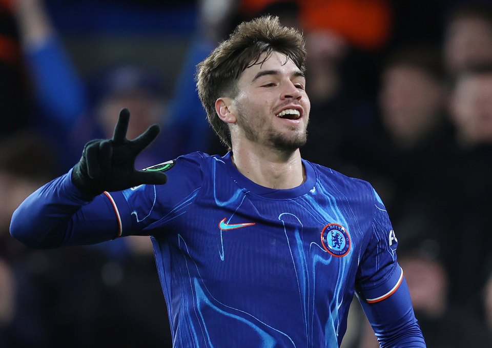 Marc Guiu of Chelsea celebrates scoring a hat trick.