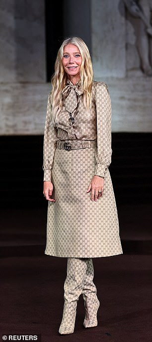 Gwyneth, 52, took inspiration from the iconic designer with a head-to-toe outfit in Gucci's iconic print as she posed ahead of the showcase.