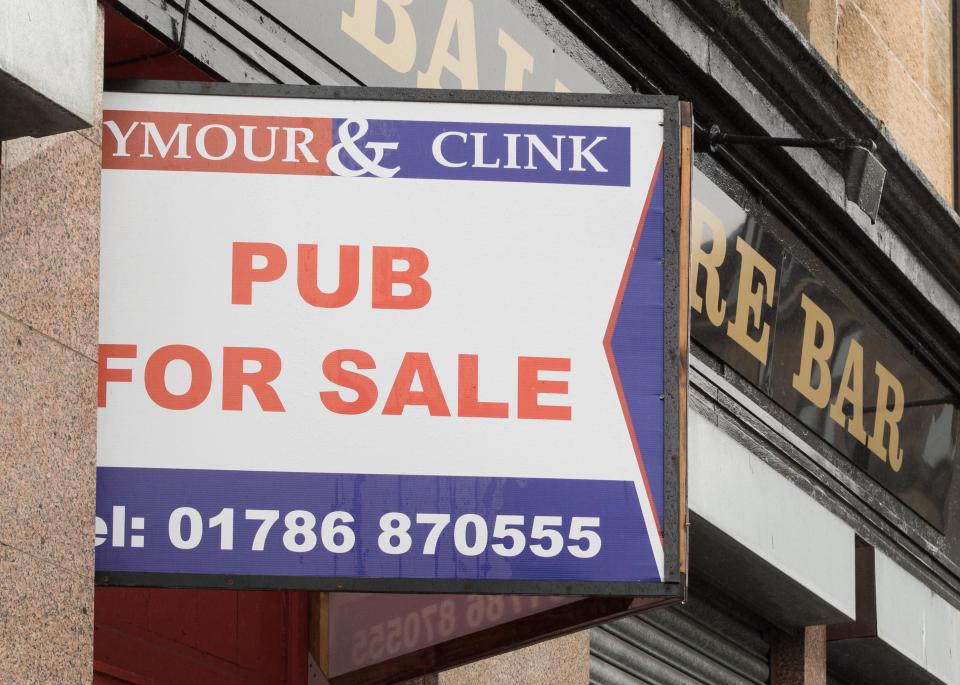 "Pub for Sale" sign for the Balmore Bar in Possilpark, Glasgow, Scotland, UK.