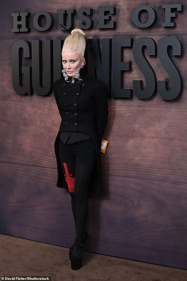 Daphne, 57, daughter of Jonathan Guinness and Suzanne Lisney and granddaughter of Diana Mitford, commanded attention thanks to her bold bouffant hairdo