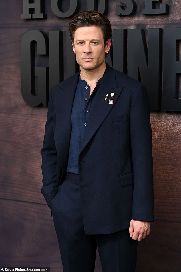 Paying homage to the iconic Irish stout, the BAFTA nominee also pinned several Guinness-themed brooches to his lapel