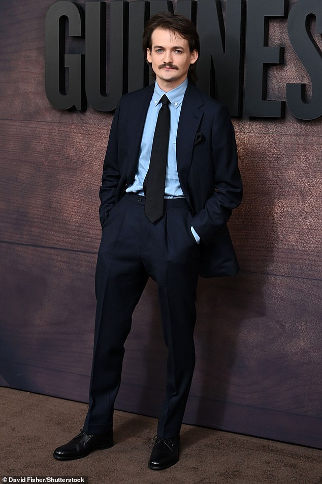 Jack - who plays Byron Hughes - kept things classic and smart in a dark blue suit completed with collared shirt and a matching navy tie