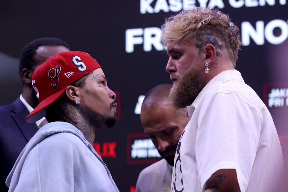 Gervonta "Tank" Davis and Jake Paul face off at a news conference.