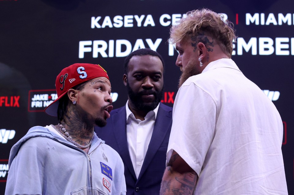 Gervonta Davis and Jake Paul face off at a press conference.
