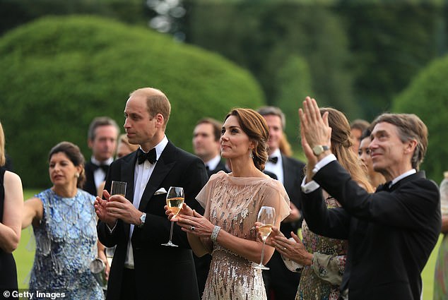 William and Kate are pictured with guests at the gala dinner at Houghton Hall on June 22, 2016