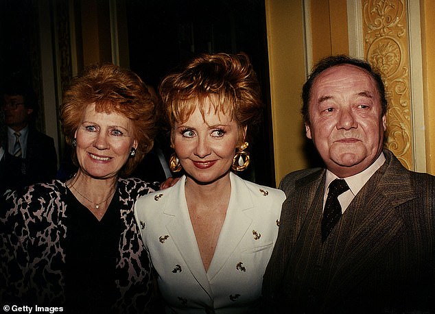 Lulu spoke about her dad's alcoholism on the show - the singer (middle) pictured with her mum Betty McDonald and her dad Eddie Lawrie
