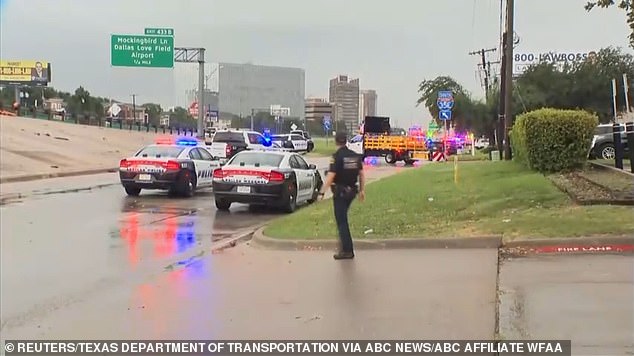 The sniper, who police sources described as a white man, shot himself dead as law enforcement agents closed in on him