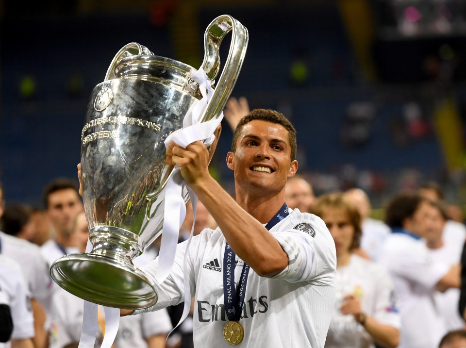 Cristiano Ronaldo lifts the Champions League trophy.