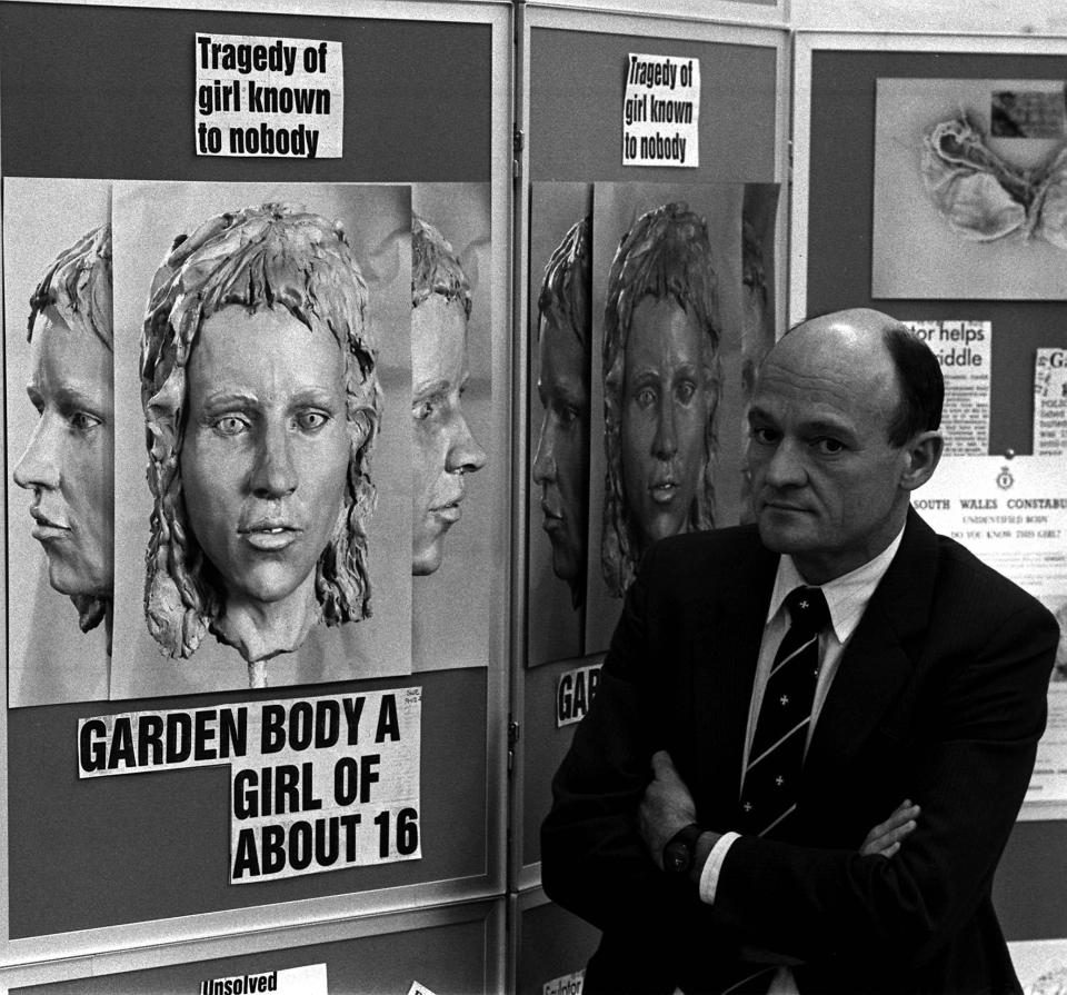 Det. Chief Super. John Williams of the South Wales Police standing next to forensic facial reconstructions of a deceased girl, along with crime scene details and newspaper headlines.