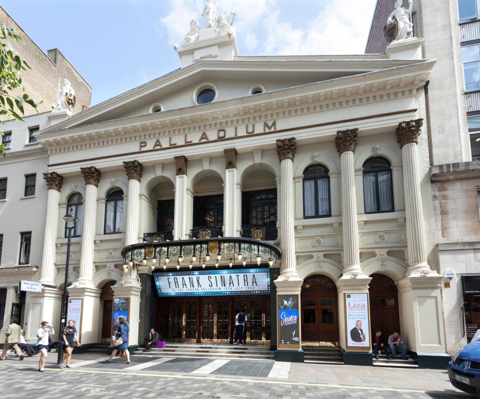 London Palladium Theatre with a "FRANK SINATRA" sign on its facade.