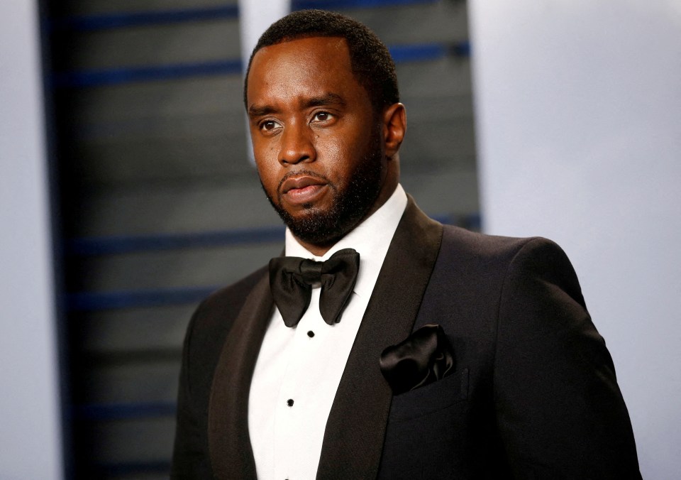 P. Diddy wearing a black tuxedo and bow tie.