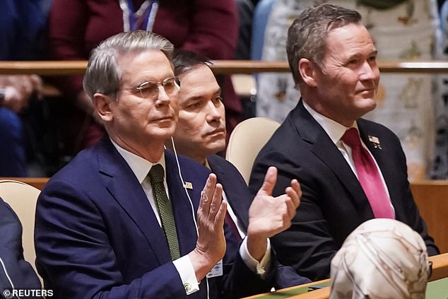 Treasury Secretary Scott Bessent (left) can be seen wearing an earpiece as he listened to President Donald Trump's speech Tuesday morning at the UN General Assembly. A UN official told the Daily Mail that the volume is kept low so speeches can be simultaneously translated