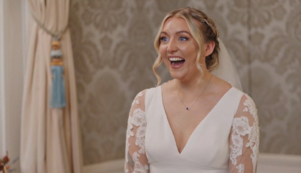 Sarah from Married at First Sight UK, in a wedding dress, with a surprised expression.